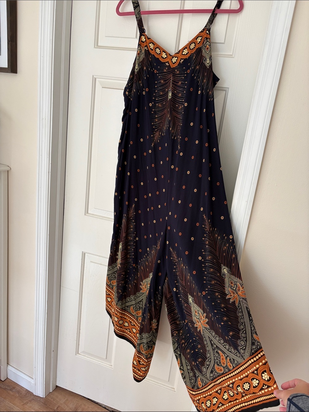 BloomChic Black Jumpsuit with Orange Paisley Accents